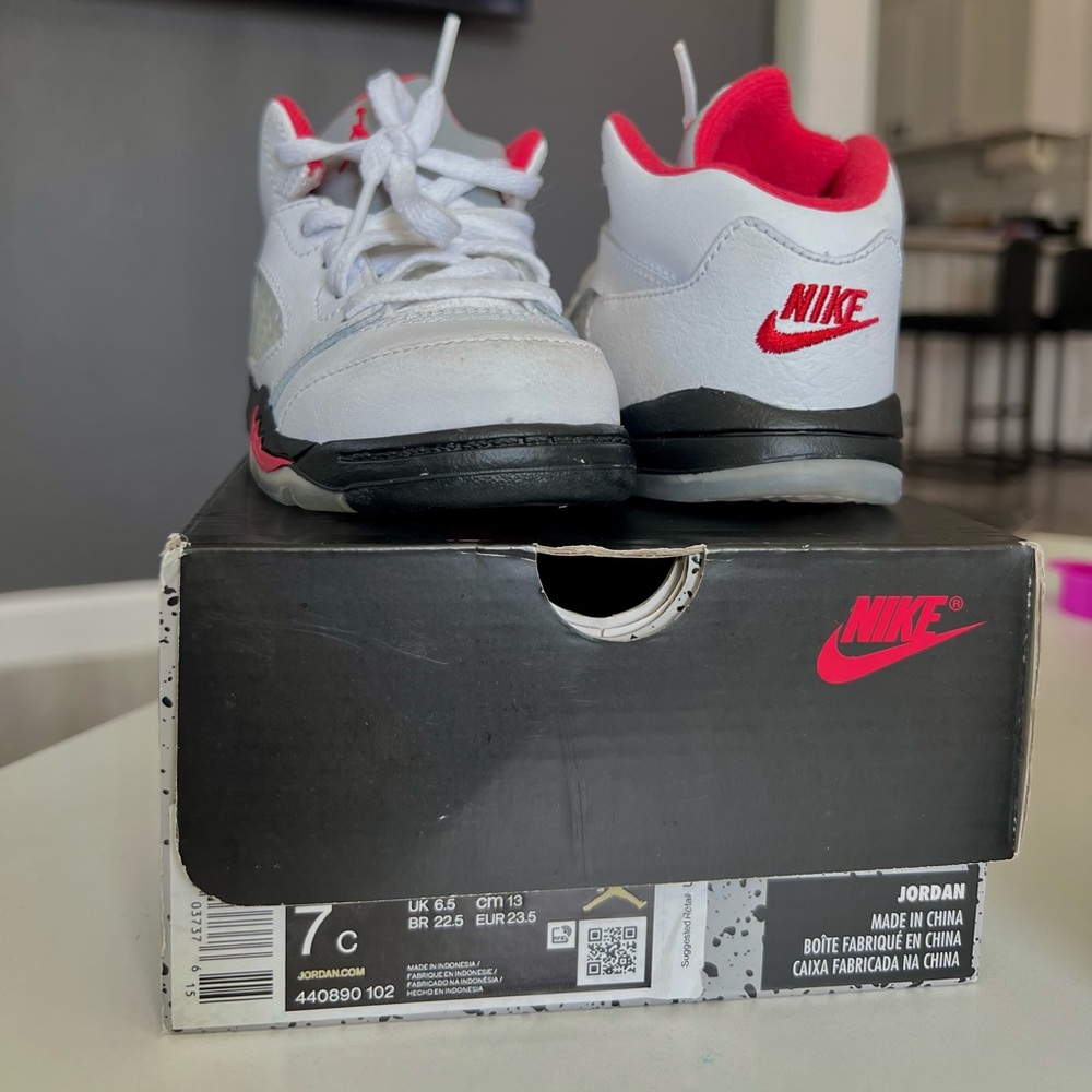 Jordan 5 Retro (TD) True White/ Fire Red-Black in a size 7